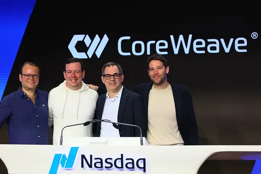 Питер Саланки, технический директор CoreWeave, Брайан Вентуро, директор по стратегии и основатель CoreWeave, Майк Интрэйтор, генеральный директор и основатель CoreWeave, и Брэннин Макби, директор по развитию и соучредитель CoreWeave, позируют для фотографий во время первичного публичного размещения акций (IPO) компании в штаб-квартире Nasdaq 28 марта 2025 года. Питер Саланки, технический директор CoreWeave, Брайан Вентуро, директор по стратегии и основатель CoreWeave, Майк Интрэйтор, генеральный директор и основатель CoreWeave, и Брэннин Макби, директор по развитию и соучредитель CoreWeave, позируют для фотографий во время первичного публичного размещения акций (IPO) компании в штаб-квартире Nasdaq 28 марта 2025 года.