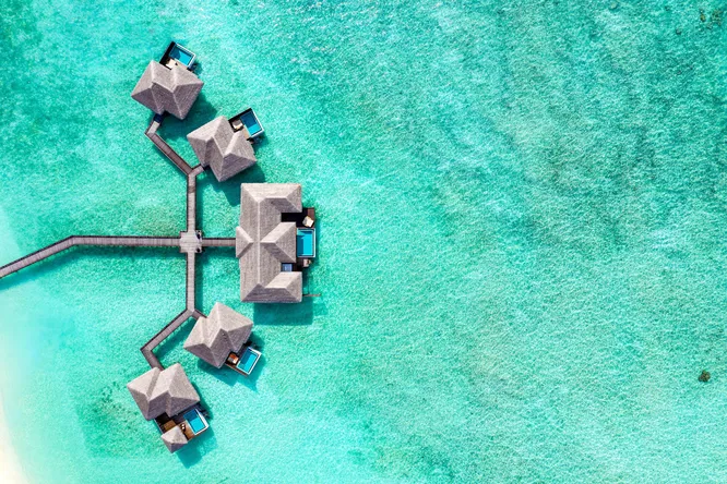 Виллы над водой Sheraton Maldives